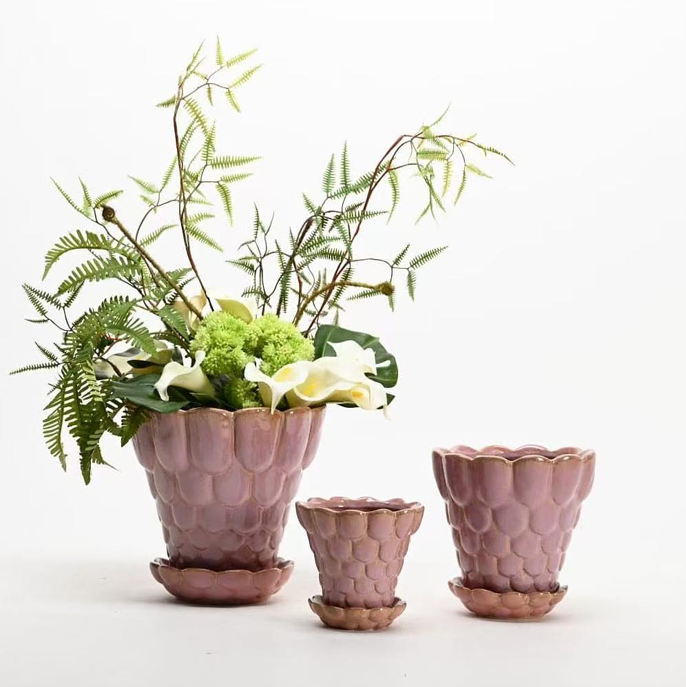 Sculptural ceramic vase on Nordic warm-white studio background